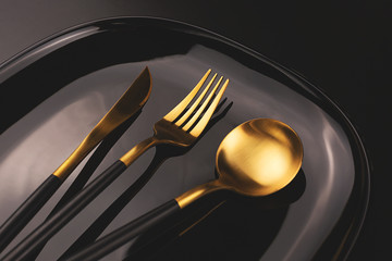 Dark creative shot of cutlery set.