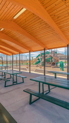 Fototapeta na wymiar Vertical Outdoor shelter area in recreational fun park