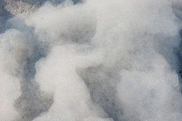 Background, texture - white air foam - foam party outdoors.