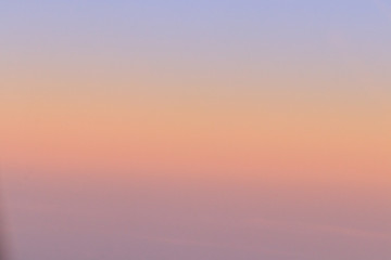 Sky - OCTOBER 16, 2019:  Landscape sunrise view without clouds from airplane window seat