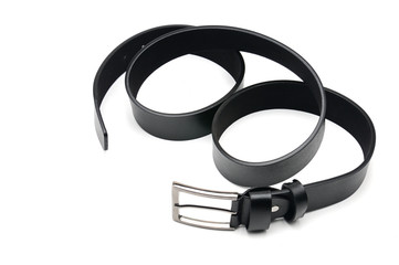 Black belt with a metal fastener on a white background