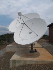Two 5 metre diameter satellite receive dishes.
