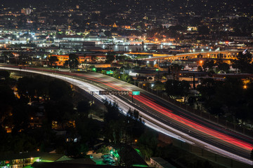 Fototapeta na wymiar Night view of traffic on Interstate 5 in downtown Burbank near Los Angeles, California.
