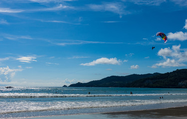 Parasailing, or parascending or para kiting, a recreational kiting activity, flying in the clear...