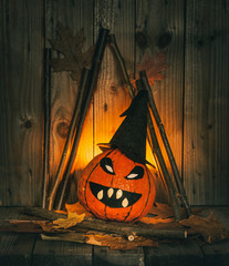 Halloween pumpkin decoration with moody light. Happy Halloween!