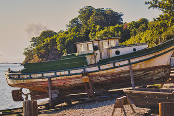 Decommissioned shrimp boat docked on skits