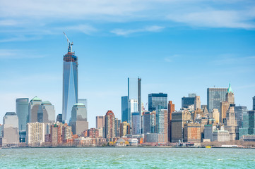 Obraz premium New York City with Manhattan Skyline over Hudson River..