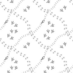 Seamless background with bird's tracks. Monochrome hand drawn texture.