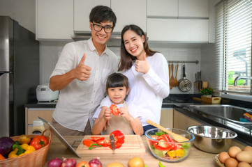 family member enjoy together cooking on line in home holiday