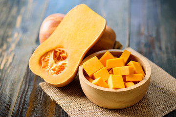 Sliced butternut squash in a bowl for cooking - obrazy, fototapety, plakaty
