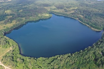 Obraz na płótnie Canvas Photo of a lake on top helicopter blue