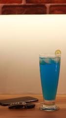 Blue Lagoon cocktail with ice and lime