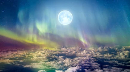 Foto op Canvas Northern lights (Aurora borealis) in the sky over clouds with full moon "Elements of this image furnished by NASA" © muratart