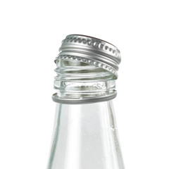 Glass bottle with metal lid. Close up. Isolated on white background.
