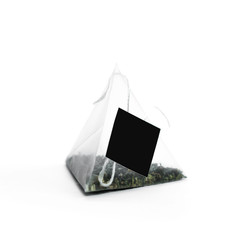 Triangular tea bag. Close up. Isolated on white background