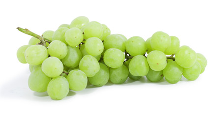 Green grapes lying horizontally on white background