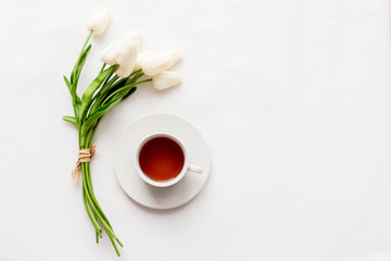 Fototapeta na wymiar white ceramic tea cup standing on white background