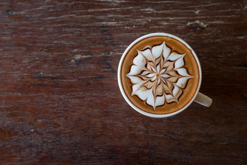 Cup of coffee with  latte art on top