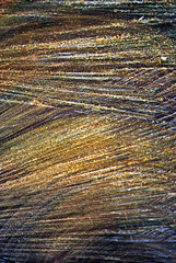 Background texture of wood with tree rings and chain saw marks