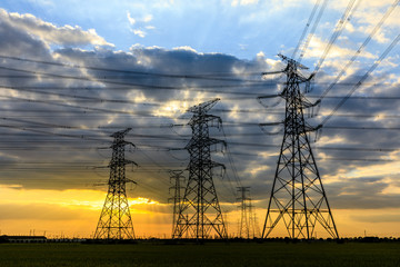 High voltage electricity tower sky sunset landscape,industrial background.