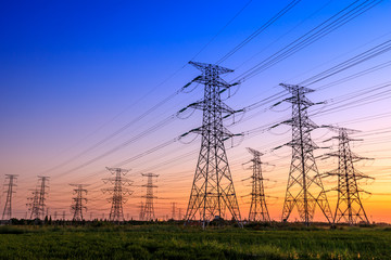 High voltage electricity tower sky sunset landscape,industrial background. - obrazy, fototapety, plakaty