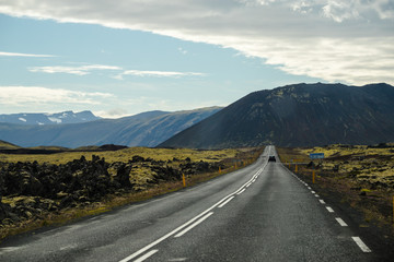Picture of beautiful view summer of car on the road,  View of road trip at Westfjords in Iceland