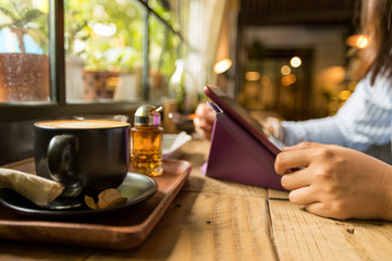 Picture of woman working and using tablet at coffee shop, lifestyle people in the city