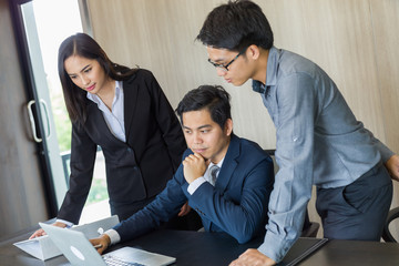 Picture of successful asian business teams is sitting in office and planning work new idea