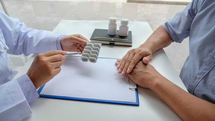 Female nurses explained and recommended treatment along with a prescription after the patient saw a doctor and got results regarding illness problems. Medical and health care concepts