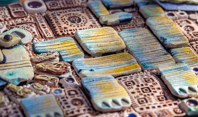 Clay Jewelry. texture of clay ethno products. Ethnic Jewelry made of clay.