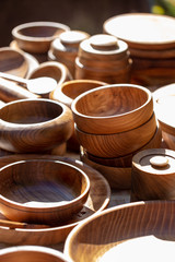 wooden utensils. natural wood kitchen utensils - plates and supplies