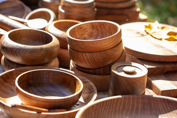 wooden utensils. natural wood kitchen utensils - plates and supplies