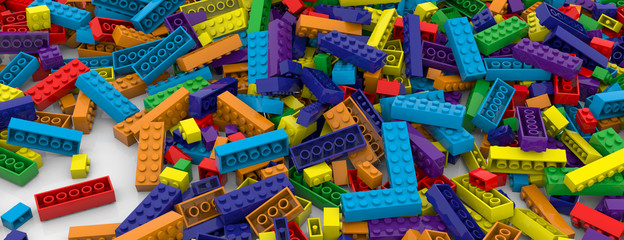 Colored toy bricks background. Rainbow colors. Random coloured plastic construction blocks. 3D illustration. 3D rendering