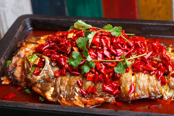 A plate of grilled fish, sichuan cuisine