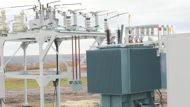 Solar Station Equipment. A transformer at a power plant, a transformer at a solar power station.