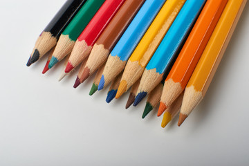 Color pencils on white background, copy space