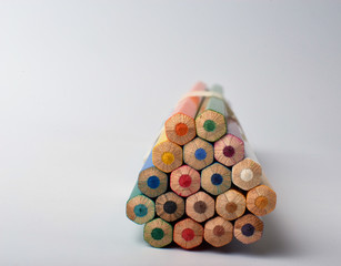 Color pencils on white background, copy space