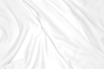 Fototapeta na wymiar Wrinkles on white fabrics abstract background