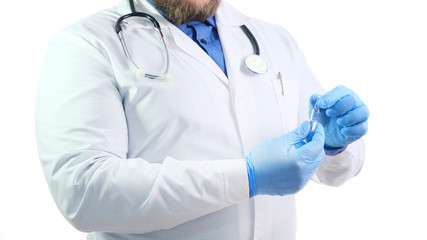 The doctor in a white coat holds a test tube in his hands