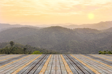 Wooden table with morning landscape background