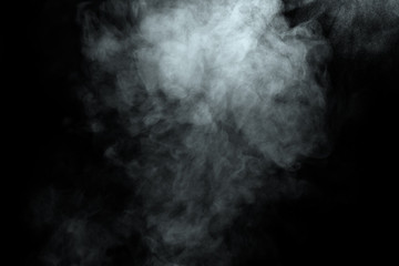 Abstract  powder or smoke isolated on black background
