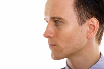 Obraz premium Face of young handsome businessman in formal clothing