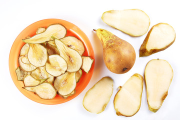 Ingredients for fruit chips made of pears on white background. Healthy vegetarian dietary food