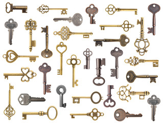 Set of old keys isolated on white background
