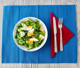 Healthy breakfast with egg and green vegetables