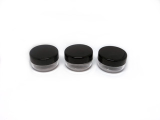 Obraz na płótnie Canvas Set of 3 black clear empty containers for skin care cosmetics or food storage 