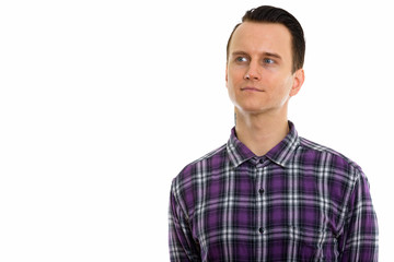 Studio shot of young handsome hipster man