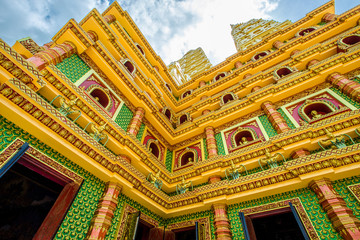Fototapeta premium The beautiful sculpture background of, Wat Bang Thong, surrounded by trees, has a large area, is a religious tourist attraction in Krabi, with tourists always visiting, Thailand