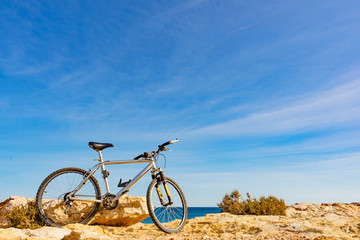 Bicycle on beach, active lifestyle.