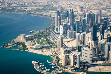 Aerial Shot of Modern Skyscrapers and Corniche Waterfront (Park) in Downtown Doha (West Bay) on a Sunny Clear Day - Doha, Qatar
